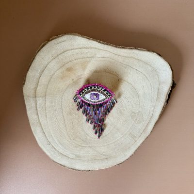 Broche ojo rosa